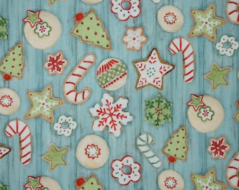 Christmas Cookie Fabric, Christmas Sugar Cookies with Icing designed by Susan Winget for Springs Creative Novelty Cotton Fabric