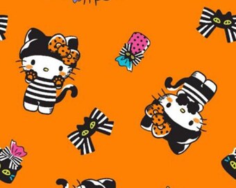 Hello Kitty Halloween Fabric, Hello Kitty Halloween Bows on Orange Licensed by Sanrio for Springs Creative Novelty Cotton Fabric