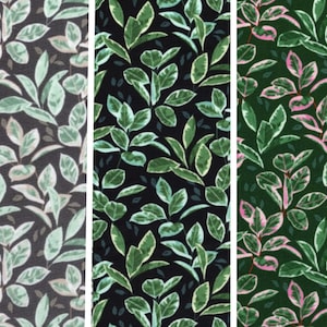 May include: Three fabric swatches with a repeating pattern of green leaves on a black background. The left swatch has a lighter green leaf with a white outline. The middle swatch has a darker green leaf with a white outline. The right swatch has a pink and green leaf with a white outline.