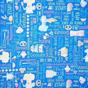 Baking Words Fabric, Freshly Baked Words on Blue Gnomebody Bakes it Better by Andi Metz for Kanvas Studio Benartex Quilting Cotton Fabric
