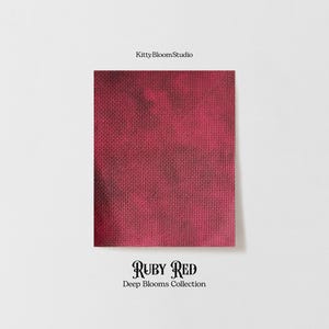 May include: A close-up of a deep red fabric with a textured surface. The fabric is a deep ruby red colour and has a subtle tie-dye pattern. The fabric is labelled "Ruby Red Deep Blooms Collection".