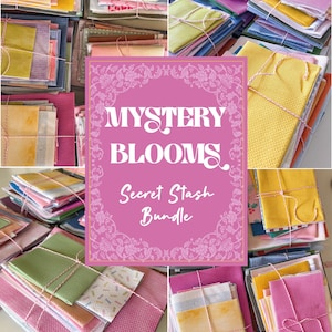 May include: Stacks of colorful fabric squares in shades of pink, yellow, green, and blue, tied with twine. The image includes a pink sign with the words "MYSTERY BLOOMS" and "Secret Stash Bundle" in white script.