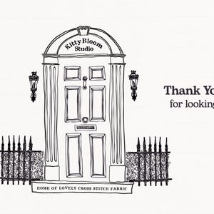 A black and white illustration of a studio entrance with a sign that says "Kitty Bloom Studio" and a decorative arch above the door. There is a small plaque on the door that reads "Home of Lovely Cross Stitch Fabric".