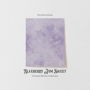 May include: A purple and white tie-dye fabric swatch with the text "Blueberry Jam Sweet" and "Orchard Blooms Collection" printed below.
