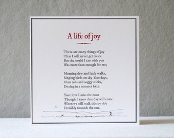 May include: A white card with a red title "A life of joy" and a poem about the simple joys of life. The poem ends with the line "Invisibly towards the sun."