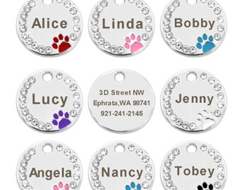 Dog tag rond met pootje en kristallen gepersonaliseerd