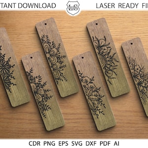 Pode incluir: Conjunto de seis designs de marcadores de página cortados a laser que apresentam padrões florais intrincados. Os marcadores de página são feitos de madeira e têm um acabamento castanho natural. Os designs são perfeitos para adicionar um toque de elegância a qualquer livro.
