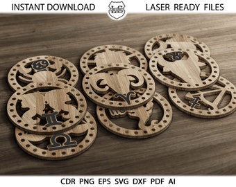 May include: Twelve wooden laser cut zodiac signs, each with a different astrological symbol. The signs are arranged in a circle on a wooden surface. The signs are all in black and white.