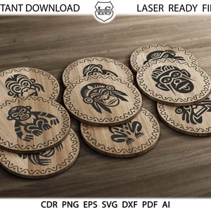 May include: Eight wooden coasters with black tribal animal designs. The designs include a monkey, a frog, and a bird. The coasters are arranged in a circle on a wooden surface.