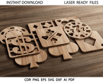 May include: A set of laser cut wooden casino themed designs. The designs include a dollar sign, a roulette wheel, a playing card with a spade, a playing card with a heart, a playing card with a club, and a playing card with a diamond.