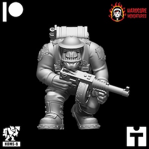 May include: A grey plastic miniature of an Orc soldier wearing a helmet and holding a machine gun. The Orc is wearing a backpack and has a determined expression on its face.