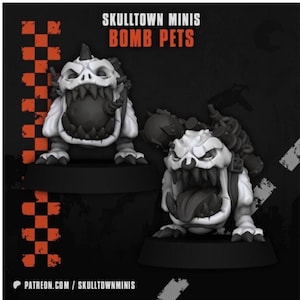 May include: Two white and gray miniature figures of Bomb Pets with large mouths and sharp teeth. The figures have a skull-like appearance and are on black bases. The text "SKULLTOWN MINIS" and "BOMB PETS" is displayed in orange.