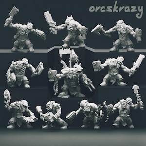 May include: A collection of gray miniature Orc figurines, each posed with a weapon. The Orcs are in various stances, holding axes, swords, and bladed weapons. The figures are on a dark gray surface, with the text "orcskrazy" in the upper right corner.