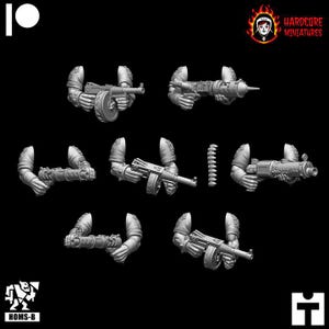 May include: Six 3D printed miniature arms holding different variations of a machine gun with a rotating drum magazine. The arms are posed in various positions, some holding the gun at the ready, others holding it at their side. The miniatures are printed in a light gray plastic.
