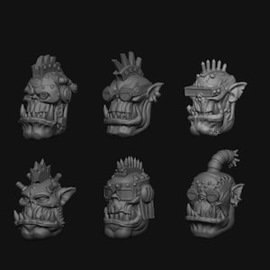 May include: Six 3D printed miniature heads of orcs with different hairstyles and accessories, including goggles and spikes. The heads are gray and have a detailed, textured surface.
