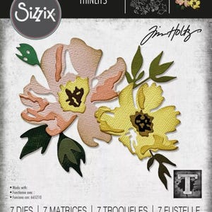 May include: Sizzix Thinlits die set featuring floral designs. The set includes seven dies for creating layered flowers in shades of yellow, peach, and green. The package includes the text "Jim Holtz" and "665209".