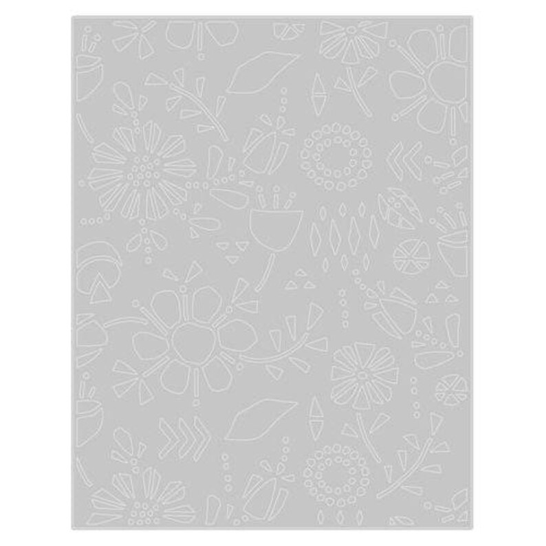 May include: A gray background with a repeating pattern of white floral and botanical designs. The pattern includes various flower shapes, leaves, and geometric elements, creating a textured, artistic look. The design is evenly distributed across the surface.