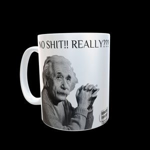 May include: White ceramic mug featuring a black and white image of Albert Einstein with the text "NO SHIT!! REALLY???" above his head. The mug also has the text "DEBATE EXPERT" on the side.