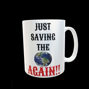 Funny Coffee Mug &quot;Just Saving The World Again!!&quot; 11 Oz. Ceramic Mug