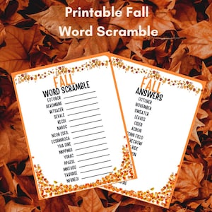 May include: Two printable fall-themed word scramble game sheets. The sheets are white with orange borders decorated with fall leaves. One sheet is labeled "Word Scramble" and the other "Answers". The background is a bed of fall leaves.
