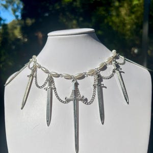 Seven of swords necklace