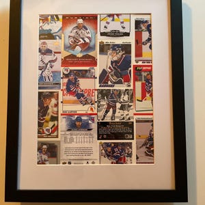 New York Rangers Wall Decor made from real hockey cards. Fits 11x14 frame (not included). One-of-a-kind gift!