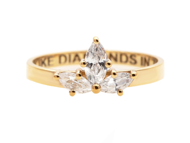 Lotus Flower Engagement Ring With Marquise Cut Diamonds in a Three