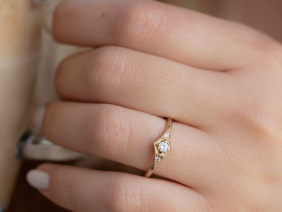 Delicate Vintage Style Engagement Ring With a Brilliant Cut