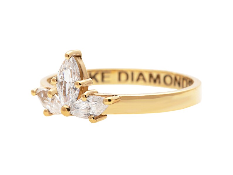 Lotus Flower Engagement Ring With Marquise Cut Diamonds in a Three