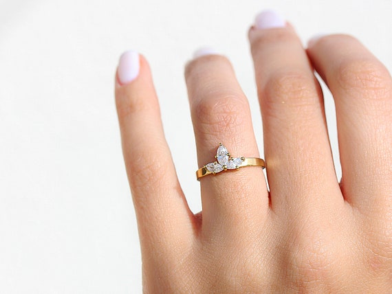 Lotus Flower Engagement Ring With Marquise Cut Diamonds in a Three