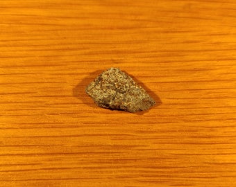 Pakistan 2.83 g near Zhob 2.1 x 1.86 x 0.34 cm aprox Zhob Slice is a Chondrite Meteorite that felt on earth on the 9 January 2020