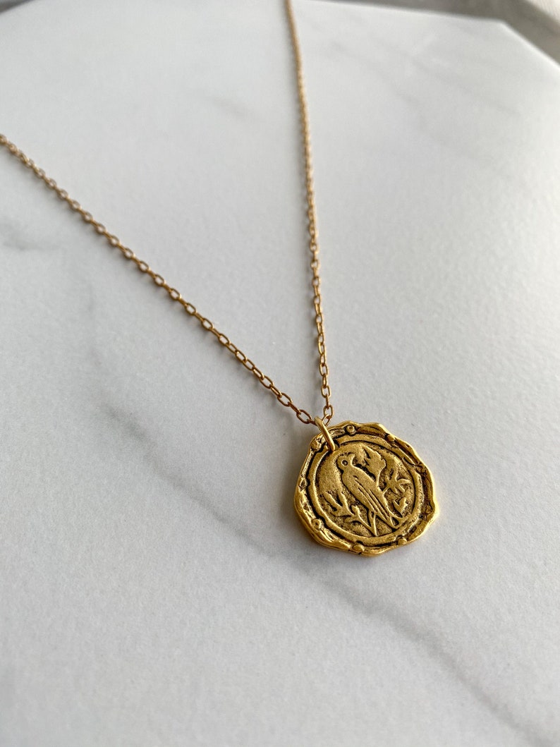 Brass bird necklace