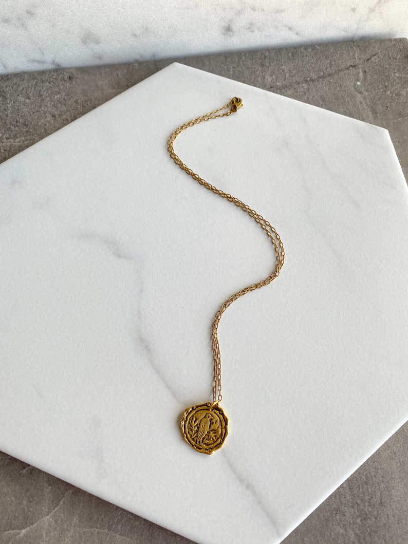 Brass bird necklace