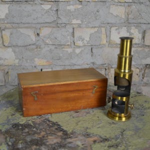 Edwadian brass field microscope, British: original antique scientific microscope, early 20th C, in original wooden box