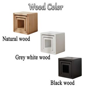 May include: Three nesting tables in natural wood, grey white wood, and black wood.  Wood Color.