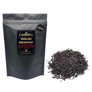 May include: A black resealable pouch of English Breakfast tea with the brand name Camellios and the text "Our traditional blend of delicious black teas, with strong flavour and rich aroma. Hand blended in the UK. Minimum Net Weight 200g." A pile of loose leaf black tea is in the background.