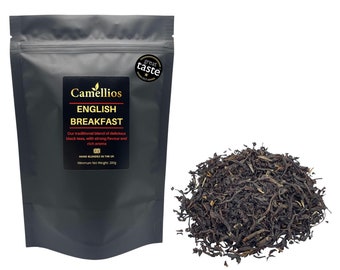 May include: A black resealable pouch of English Breakfast tea with the brand name Camellios and the text "Our traditional blend of delicious black teas, with strong flavour and rich aroma. Hand blended in the UK. Minimum Net Weight 200g." A pile of loose leaf black tea is in the background.