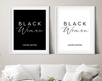 May include: Two framed prints with the text "BLACK Woman" in white script on a black background and a white background. The text "LIMITED EDITION" is printed below the script on both prints.