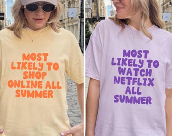 May include: Two short-sleeved t-shirts, one yellow and one lavender, each with a bold graphic. The yellow shirt reads "MOST LIKELY TO SHOP ONLINE ALL SUMMER" in orange. The lavender shirt says "MOST LIKELY TO WATCH NETFLIX ALL SUMMER" in purple.