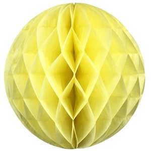 May include: A bright yellow paper honeycomb ball decoration. The spherical ornament features a geometric diamond pattern created by the folded paper. This decorative item is suitable for parties and events.