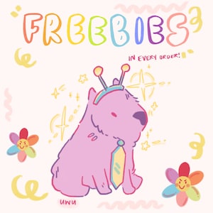 May include: A pink cartoon dog wearing a blue and yellow astronaut helmet with a yellow tie. The dog is surrounded by stars and the text "FREEBIES" in rainbow colours. The text "IN EVERY ORDER!" is also included in the image.