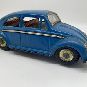 Vintage Blue VW Beetle Tin Friction Toy Car: Collectible Scale Model