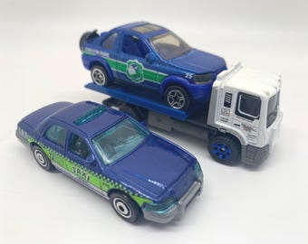 Matchbox LAX Taxi, Land Rover Freelander, Lote King de plataforma plana