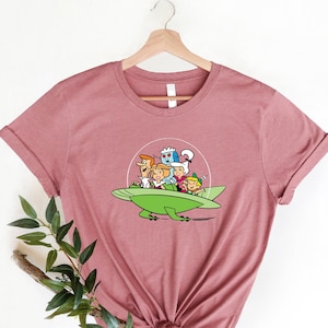 Blast into the Future with Our Retro-Futuristic Jetsons T-Shirt: Featuring George, Jane, Judy, Elroy, Rosie, and Astro!