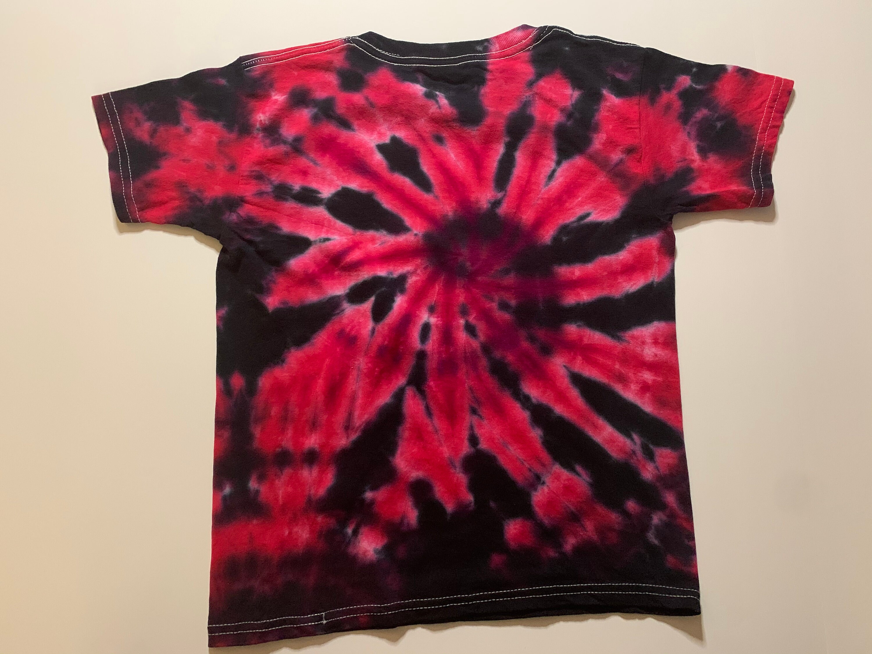 red and black tie dye sweatpants