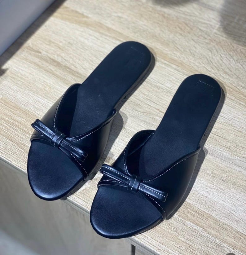 minimalist flat slip on sandals black leather