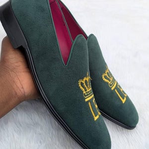 Close up green embroidered dress shoe