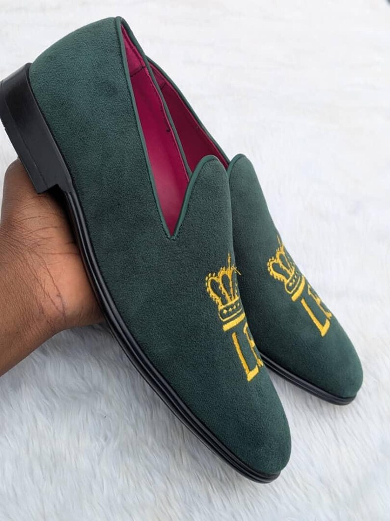 Close up green embroidered dress shoe