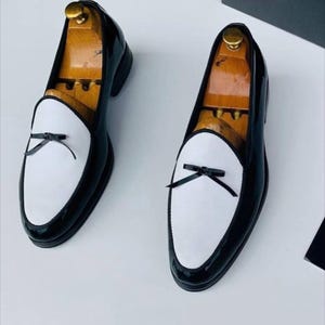mens dress loafer black and white bow tie style shoe