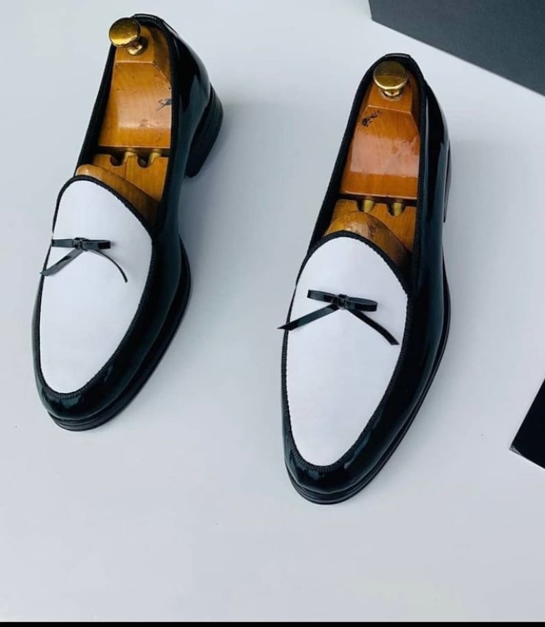 black white patent leather mens bow loafer close up